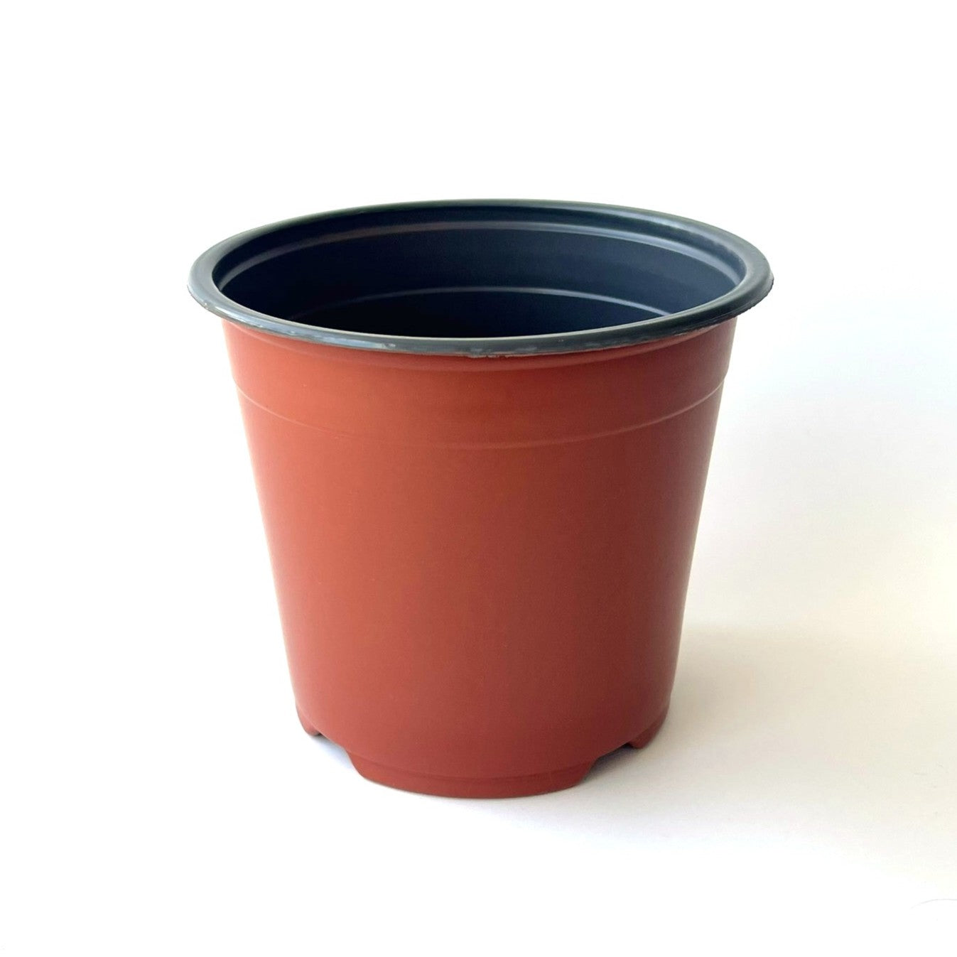 14cm brown nursery pot on white background
